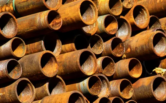 Cut ends of copper pipe stacked in a bundle