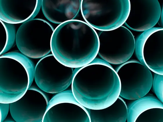 Stacked drainage pipe ends seen end on