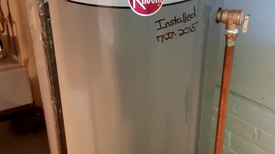 The top of a newly installed gas storage water heater
